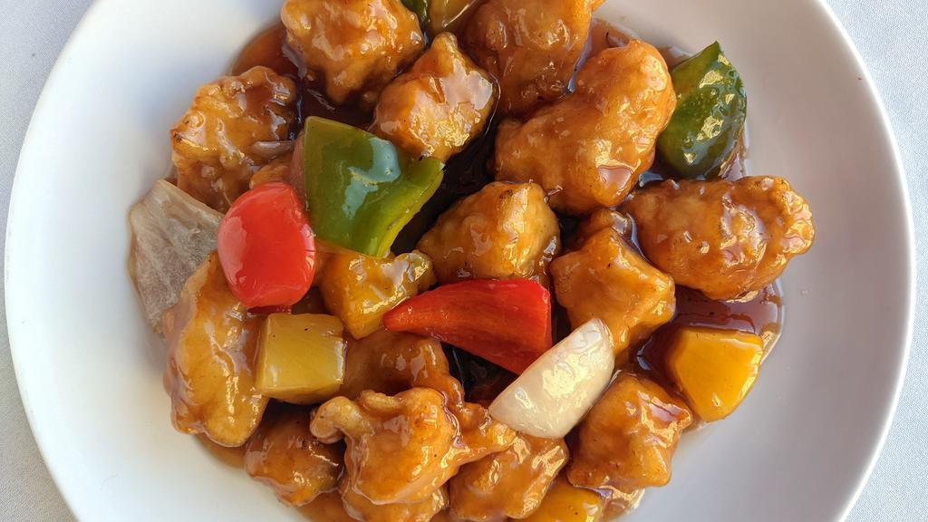 Sweet And Sour Chicken 菠蘿甜酸雞 · Deep-fried dark meat chicken pieces with bell peppers, pineapple and housemade sweet and sour sauce