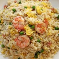 Yang Chow Fried Rice 楊州炒飯 · Classic fried rice with shrimp, ham, chicken, onion, eggs, and peas