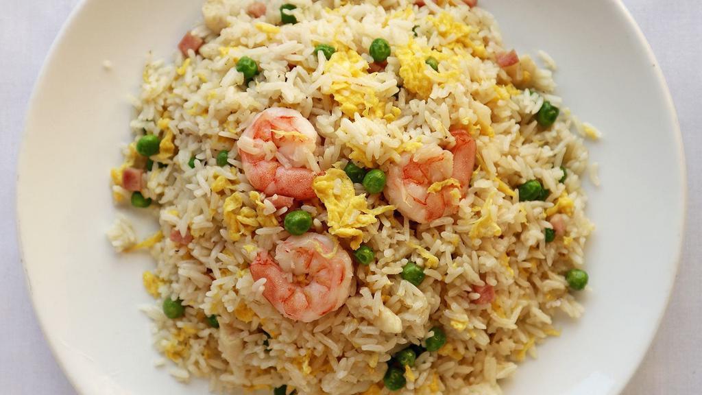 Yang Chow Fried Rice 楊州炒飯 · Classic fried rice with shrimp, ham, chicken, onion, eggs, and peas