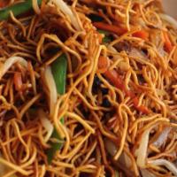 Vegetarian Stir-Fried Crispy Noodles With Soy Sauce 豉油皇炒麵 · Vegetarian. Thin Chinese egg noodles stir-fried with carrots, mushrooms, bean sprouts, onion...