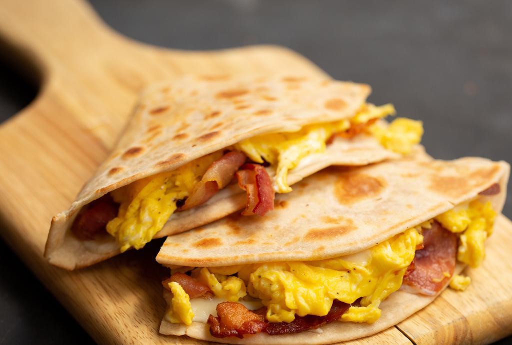 Eggs And Mozzarella Cheese Piada · Three scramble eggs and mozzarella cheese