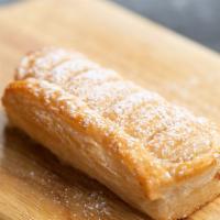 Apple Turnover · Flaky pup pastry dough, filled with green apples.