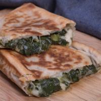 Spinacino (V) · Spinach, ricotta, feta and mozzarella cheese.