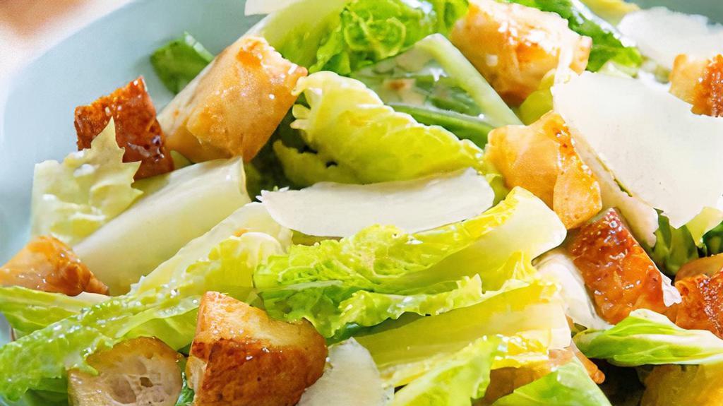 Caesar Salad  · Romaine lettuces, herbs croutons, shave parmesan and caesar dressing