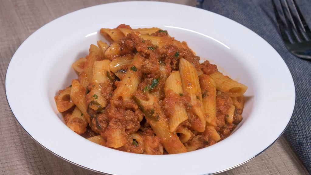 Penne Alla Bolognese · Our chef's authentic beef ragout.