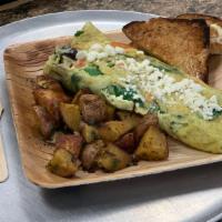 Spinach & Feta Omelette · Omelet with spinach, tomatoes, olives, and feta cheese.