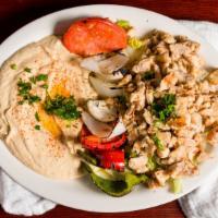 Chicken Shawarma (Platter) · Rotisserie cooked marinated chicken, topped with tahini sauce.
