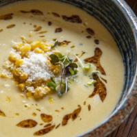 Yellow Corn Soup · corn esquites - cotija cheese - charred tortilla oil (contains dairy, vegetarian)