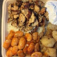 Yiayia’S Platter · Chicken shish with rice, Gigantes beans, lemon potatoes, and tzatziki.