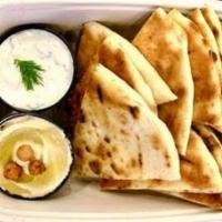 Grilled Pita (2) & Dips (2) Plate · Two grilled pita and choice of two small dips.