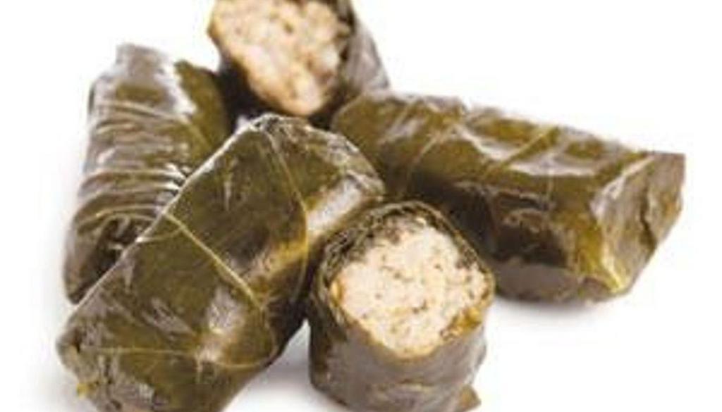Dolmades Stuffed Grape Leaves · Grape leaves stuffed with rice and herbs.  Vegan.