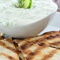 Tzatziki Dip · Greek original!  Yogurt, garlic, dill, and cucumber.  Goes great with anything!  (Does not c...