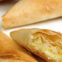 Cheese Pies (2) (Tyropita) · Two triangles of Filo stuffed with cheeses.