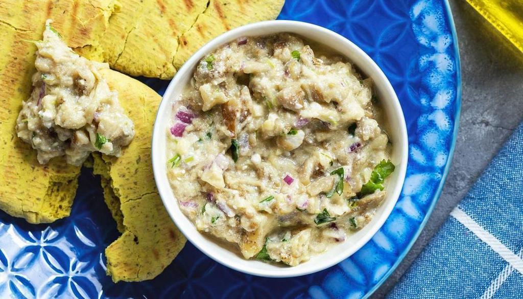 Eggplant Dip · Roasted eggplant with fresh garlic and roasted pepper, olive oil and seasoning.  Order some pita to go with it!
