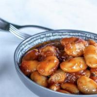 Gigantes Beans · Imported giant lima beans from Greece with a light tomato & herb marinade.