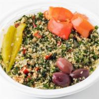 Tabbouleh Salad · Finely chopped mix of bulgur wheat, mint, onion, red pepper, and parsley.