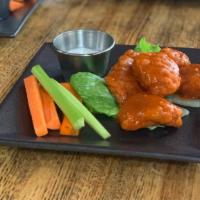 Boneless Wings · Tender boneless wings with your choice of sauce.