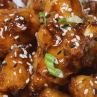 General Tso’S Cauliflower · Blue Point Beer Battered Cauliflower, General Tso’s Glaze, Sesame Seeds and Scallions