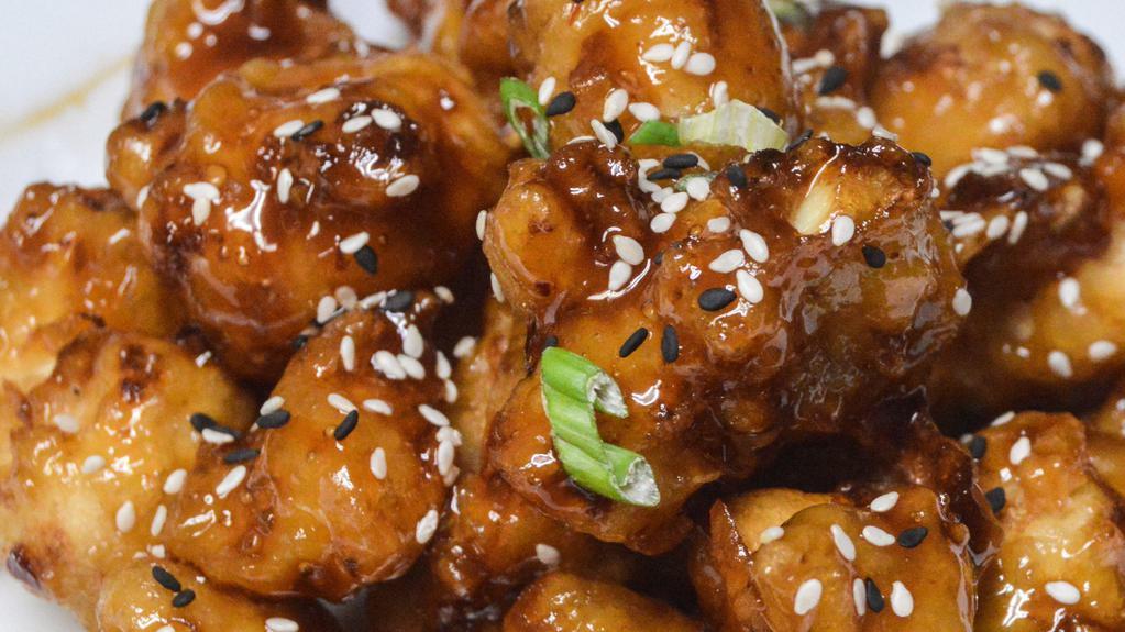 General Tso’S Cauliflower · Blue Point Beer Battered Cauliflower, General Tso’s Glaze, Sesame Seeds and Scallions