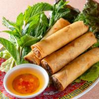 Pork Spring Rolls · 4 pcs crispy spring rolls with pork and shiitake mushroom with a side of lettuce, mint, and ...
