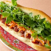 Chinese Sausage Bahn Mi · Pickled radish and carrot, cucumber, cilantro, jalapeno, sriracha, maggi sauce, and mayonnai...