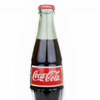 Mexican Coke · Coca Cola served in a glass bottle