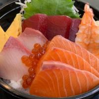 Chirashi · Fresh Tuna Sashimi, Salmon Sashimi, Hamachi Sashimi,  ikura, ebi, and tamago over sushi rice