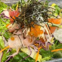 Mama Kims Sashimi Salado · Gluten free. Fresh tuna, fresh salmon, fresh hamachi, tobiko, radish sprouts, cucumber, onio...