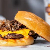 Philly Burger · 4 oz. of philly steak, sautéed onions, American cheese, ketchup, and mayo on a fresh baked d...