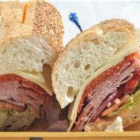 New Yorker · Boar's Head Pastrami, Mild Swiss Cheese, Lettuce, Tomato & Deli Mustard on a Hero