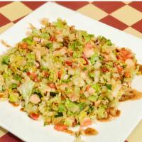 Chopped Salad · Romaine, tomatoes, cucumbers, red onions, walnuts, sun-dried tomatoes, grilled chicken and a...