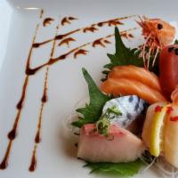 Sashimi Combo (8 Pieces) · Served with miso soup and house salad.