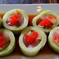 Twister Roll · Cucumber wrapped salmon, tuna, white tuna, yellowtail, avocado top with caviar and ponzu sau...