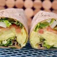 Brekkie Wrap · Scrambled Cage Free Eggs, tomato, swiss cheese, lettuce with House herb mayo on a wholewheat...