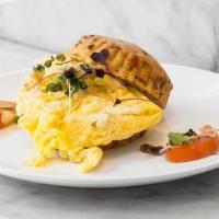 Cheddar Chive Biscuit & Eggs · Spicy cheddar and chive biscuit with Cage Free scrambled Eggs