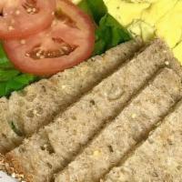 Wattle Brekkie Classic · Cage Free scrambled Eggs, 2 slices of organic multigrain toast, w/butter and a tomato & gree...