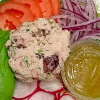 Tuna Salad · Mixed Greens tuna salad mix (Tuna, celery, parsley, dried cranberries and mayo) sliced red o...