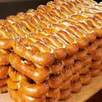 100 Real Pretzels · Hand-twisted. Fresh-baked. Always delicious.