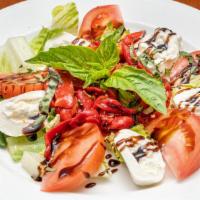 Caprese Whiz Salad · Sliced tomatoes, fresh mozzarella, roasted peppers, basil & balsamic glazed.