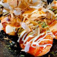 Takoyaki · Cabbage, octopus, wheat flour, bonito flakes, seaweed, mayo and sauce