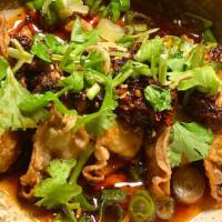 Spicy Vegetable Dumplings · Deep fried vegetable dumplings, original spicy sauce, cilantro, scallion, fried onion -Vegan-