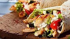 Grilled All Natural Chicken Pita · Lettuce, tomato, onions, tzatziki sauce. Add skin on fries, sweet potato fries for an additi...