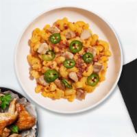 Chicken Bacon Mac · Premium chicken, bacon, cooked in a creamy cheese sauced and topped with jalapenos to give a...