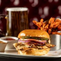 Grilled Chicken Burger · Grilled chicken breast, Irish bacon and pepper jack cheese on a toasted bun. Served with swe...