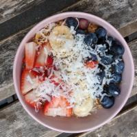 Granola Bowl · plain yogurt, berries, banana, honey, coconut and chia seeds.