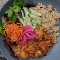 Coconut Curry Chicken Bowl · gluten-free. Served with brown rice or vermicelli, mixed green salad.