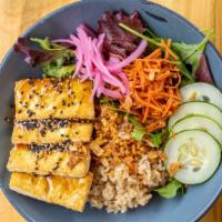 Sesame Tofu Bowl · Vegan. Served with brown rice or vermicelli, mixed green salad.