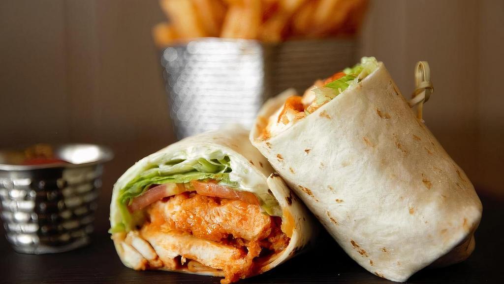 Buffalo Chicken Wrap · Crispy chicken, Buffalo sauce, lettuce, tomato and ranch and served with fries.