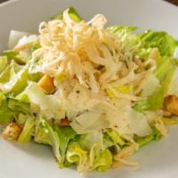 Caesar Salad · With romaine, shaved parmesan, croutons, onion strings and homemade caesar dressing.