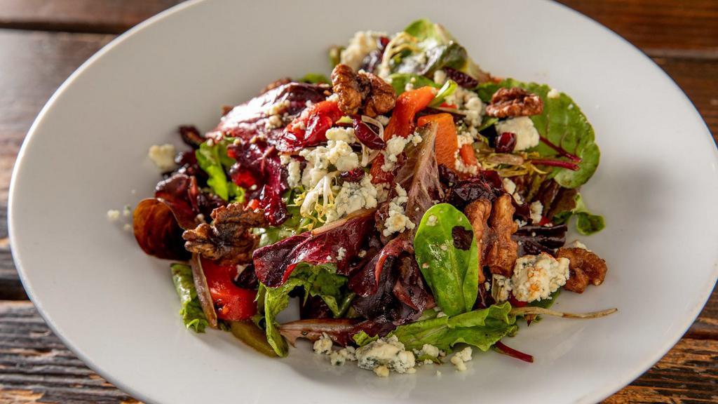 Club Salad · With walnuts, roasted peppers, bleu cheese, dried cranberries and mesclun greens with balsamic vinaigrette.